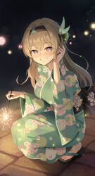 1girl absurdres black_footwear black_hairband blush commentary_request firefly_(honkai:_star_rail) green_kimono grey_hair grin hair_between_eyes hairband hand_up highres holding holding_fireworks honkai:_star_rail honkai_(series) japanese_clothes keikei_(kitty_colors) kimono long_hair long_sleeves looking_at_viewer print_kimono sandals smile solo squatting wide_sleeves