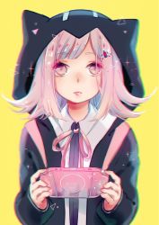 Rule 34 | 2016, animal hood, artist name, black hoodie, blurry vision, cat hood, chromatic aberration, danganronpa (series), danganronpa 2: goodbye despair, expressionless, game console, hair flaps, handheld game console, highres, hood, hoodie, looking at viewer, nanami chiaki, neck ribbon, parted bangs, parted lips, pink eyes, pink hair, playstation portable, ribbon, school uniform, triangles, upper body, yellow background, yennineii
