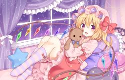 Rule 34 | 1girl, bed, blonde hair, bloomers, bow, colored stripes, commentary request, curtains, dress, flandre scarlet, food, full body, hair between eyes, hat, holding, holding stuffed toy, kure~pu, long sleeves, looking at viewer, lying, macaron, mob cap, on back, open mouth, pillow, red bow, red dress, red eyes, ribbon, short hair, socks, solo, star-shaped pillow, star (symbol), striped clothes, striped legwear, striped socks, stuffed animal, stuffed toy, teddy bear, touhou, underwear, white ribbon, window, wings