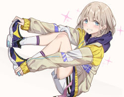 Rule 34 | blue eyes, blush, earrings, grey hair, grin, highres, holding own foot, hood, hoodie, idolmaster, idolmaster shiny colors, jewelry, long sleeves, looking at viewer, lying, multicolored clothes, multicolored hoodie, serizawa asahi, shoes, short hair, shorts, smile, sneakers, solo, sparks, tamago (eva1314056), white background, white shorts