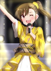 Rule 34 | 1girl, ;d, arm up, brown eyes, brown hair, dars (recolors), floating hair, futami mami, hair between eyes, hair ornament, hair scrunchie, holding, holding microphone, idol, idolmaster, idolmaster (classic), japanese clothes, kimono, long hair, microphone, obi, one eye closed, open mouth, sash, scrunchie, side ponytail, skirt, smile, solo, stage, standing, white skirt, yellow kimono, yellow scrunchie