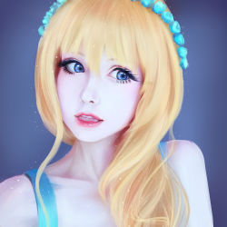 Rule 34 | 1girl, anzujaamu, blonde hair, blue background, blue eyes, blue flower, colored skin, eyelashes, flower, hair between eyes, hair flower, hair ornament, hair over shoulder, head wreath, highres, koarai, lips, lipstick, long hair, looking to the side, makeup, nose, original, parted lips, real life, red lips, simple background, solo, sparkle, strap, teeth, white skin