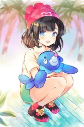 Rule 34 | 1girl, artist name, bare legs, beach, beanie, black footwear, black hair, blue eyes, blurry, blurry background, blush, creatures (company), floral print, game freak, gen 7 pokemon, green shorts, hat, highres, holding, holding pokemon, liechi, looking at viewer, nintendo, on lap, open mouth, palm tree, pokemon, pokemon (creature), pokemon on lap, pokemon sm, popplio, red footwear, red headwear, selene (pokemon), shirt, short hair, shorts, smile, squatting, tree, wooden floor, yellow shirt