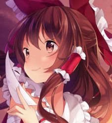 Rule 34 | 1girl, bow, brown eyes, brown hair, closed mouth, commentary, commission, english commentary, hair bow, hair tubes, hakurei reimu, hand up, hitsukuya, holding, long hair, ofuda, portrait, red bow, smile, solo, touhou