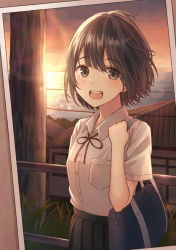 Rule 34 | 1girl, :d, adjusting strap, bad id, bad pixiv id, bag, black skirt, blush, bob cut, border, bow, bowtie, breasts, brown background, brown eyes, brown hair, commentary, cowboy shot, grass, hair strand, highres, holding, holding bag, house, light blush, looking at viewer, messy hair, ocean, open mouth, orange sky, original, photo (object), pleated skirt, pocket, power lines, railing, red bow, red bowtie, red ribbon, ribbon, school bag, school uniform, skirt, sky, small breasts, smile, solo, sunset, tanbonota46, tile roof, utility pole, white border, wind