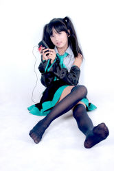 Rule 34 | black hair, cosplay, detached sleeves, hatsune miku, hatsune miku (cosplay), long hair, photo (medium), thighhighs, twintails, vocaloid