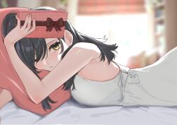 Rule 34 | 1girl, absurdres, adomiwan, black hair, blurry, blurry background, blush, box, closed mouth, commentary, dress, emi (adomiwan), gift, gift box, hair over one eye, highres, holding, holding box, indoors, long hair, lying, on bed, on stomach, one eye closed, original, pillow, sleeveless, sleeveless dress, solo, valentine, white dress, yellow eyes