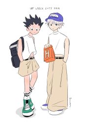 Rule 34 | 2boys, alternate costume, backpack, bag, black hair, child, english text, full body, gon freecss, hands in pockets, hat, highres, holding, holding bag, hunter x hunter, killua zoldyck, looking at viewer, male focus, multiple boys, paper bag, shirt, short hair, shorts, simple background, spiked hair, su meshi8, white background, white hair, white shirt