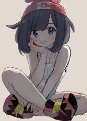 Rule 34 | 1girl, backlighting, black hair, blue eyes, blush, breasts, cleavage, collarbone, creatures (company), game freak, grin, hand on own face, hat, highres, knees, legs, looking at viewer, mcmcusg, nail polish, nintendo, pokemon, pokemon sm, selene (pokemon), shoes, shorts, simple background, sitting, smile, solo, white background