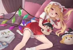 Rule 34 | 1girl, ascot, blonde hair, book, book stack, character doll, crystal, expressionless, flandre scarlet, flat chest, frilled shirt collar, frills, hakurei reimu, half-closed eyes, hat, highres, indoors, kanpa (campagne 9), kirisame marisa, light blush, looking at viewer, lying, mob cap, nishida satono, on bed, on side, one side up, open mouth, pillow, pointy ears, puffy short sleeves, puffy sleeves, purple eyes, red skirt, red vest, short sleeves, skirt, socks, solo, teeth, teireida mai, touhou, upper teeth only, vest, white hat, wings, yellow ascot, yukkuri shiteitte ne