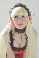Rule 34 | 1girl, blonde hair, breasts, cleavage, cleavage cutout, clothing cutout, cosplay, cosplay photo, dress, goth fashion, gothic fashion, gothic lolita, grey eyes, highres, jewelry, latin, lips, lolita fashion, medium breasts, necklace, pale skin, photo (medium), red dress