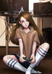 Rule 34 | 1girl, black shorts, brown shirt, brown theme, cable, commentary, controller, game controller, green eyes, head tilt, highres, holding, indoors, jungon kim, kneehighs, long hair, looking at viewer, no shoes, real life, realistic, shirt, short sleeves, shorts, sitting, socks, white socks