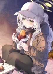 Rule 34 | 1girl, black pantyhose, blue archive, blush, brown jacket, brown scarf, commentary request, eating, fal maro, food, green eyes, green halo, grey hair, grey skirt, halo, hare (blue archive), hare (camp) (blue archive), highres, jacket, long hair, long sleeves, looking at viewer, mechanical halo, official alternate costume, pantyhose, ponytail, puffy cheeks, puffy long sleeves, puffy sleeves, roasted sweet potato, scarf, sitting, skirt, solo, sweet potato, wavy hair, white headwear, winter clothes