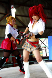 Rule 34 | 2girls, arena, blonde hair, boxing ring, breasts, candy cane (rumble roses), candy cane (rumble roses) (cosplay), chouzuki maryou, cleavage, cosplay, fingerless gloves, gloves, guitar, instrument, large breasts, miss spencer, miss spencer (cosplay), multiple girls, photo (medium), red hair, rumble roses, rumble roses xx, suzuka itsuki