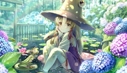 Rule 34 | 1girl, animal, blonde hair, blue flower, blush, brown eyes, brown hat, closed mouth, commentary request, day, fence, flower, frog, hat, hydrangea, knees up, lily pad, long hair, long sleeves, looking at viewer, moriya suwako, outdoors, parted bangs, pink flower, purple flower, purple skirt, purple vest, shallow water, shirt, sidelocks, sitting, skirt, smile, snake, solo, thighhighs, touhou, vest, water, white shirt, white snake, white thighhighs, wide sleeves, yuuka nonoko
