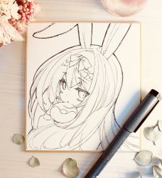 Rule 34 | 1girl, animal ears, art tools in frame, blush, bow, commentary request, cynthia riddle, doughnut, food, hair between eyes, hair bow, hand up, highres, long hair, long sleeves, looking at viewer, looking back, original, p19, parted lips, photo (medium), rabbit ears, sleeves past wrists, solo, traditional media