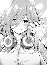 Rule 34 | 1girl, blush, breasts, cleavage, closed mouth, commentary, english commentary, go-toubun no hanayome, greyscale, hair between eyes, headphones, headphones around neck, looking at viewer, lying, medium hair, monochrome, mushi024, nakano miku, on back, sidelocks, sleeves past wrists, smile, solo, upper body