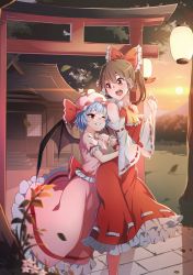 Rule 34 | 2girls, absurdres, architecture, ascot, bat wings, blouse, blue hair, blush, bow, breasts, brown hair, cloud, cowboy shot, detached sleeves, east asian architecture, feet out of frame, forest, frilled skirt, frills, grin, hair between eyes, hair bow, hair tubes, hakurei reimu, hat, hat ribbon, hatohane (tonnkotubird), highres, hug, hug from behind, lantern, looking at another, looking back, looking down, midriff, mob cap, mountain, multiple girls, nature, navel, no neckwear, one eye closed, open mouth, orange sky, outdoors, paper lantern, pink shirt, pink skirt, puffy short sleeves, puffy sleeves, red eyes, red skirt, red vest, remilia scarlet, ribbon, ribbon-trimmed sleeves, ribbon trim, shirt, short hair, short sleeves, shrine, skirt, skirt set, sky, slit pupils, small breasts, smile, standing, stone walkway, torii, touhou, tree, twilight, vest, wings, yellow ascot