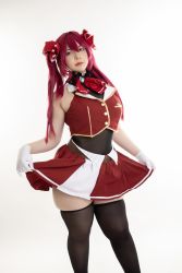 1girl, absurdres, bare shoulders, black legwear, black leotard, cosplay, cowboy shot, gloves, hair ribbon, hetero, highres, hololive, houshou marine, leotard, lipstick, long hair, looking at viewer, makeup, photo (medium), pirate, pleated skirt, red eyes, red hair, red skirt, ribbon, simple background, skindentation, skirt, skirt lift, solo, thighhighs, turtleneck, twintails, uyuy2907, vest, white background, white gloves, yellow eyes