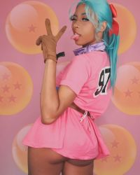 Rule 34 | 1girl, ahqua marine, belt, blue eyes, breasts, brown gloves, bulma, bulma (cosplay), clothes, clothes grab, cosplay, dark-skinned female, dark skin, dragon ball, female focus, gloves, highres, looking back, nose piercing, one eye closed, open mouth, piercing, ponytail, solo, tongue, tongue out, v