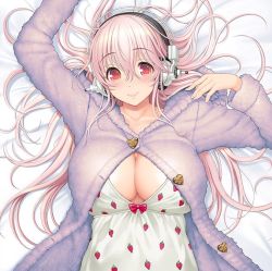 Rule 34 | 1girl, bow, breasts, buttons, cleavage, commentary request, food print, headphones, heart button, large breasts, long hair, lying, nightgown, nitroplus, on back, pink hair, purple sweater, red bow, red eyes, smile, solo, strawberry print, super sonico, sweater, tsuji santa
