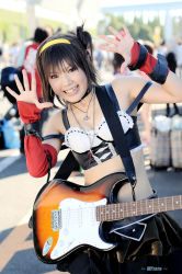 Rule 34 | 1girl, asian, belt, breasts, cosplay, elbow gloves, gloves, guitar, hairband, instrument, kipi-san, looking at viewer, midriff, outdoors, photo (medium), small breasts, solo, suzumiya haruhi, suzumiya haruhi (cosplay), suzumiya haruhi no yuuutsu