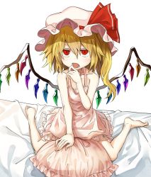Rule 34 | 1girl, bare arms, bare shoulders, barefoot, bed sheet, blonde hair, collarbone, flandre scarlet, full body, hair between eyes, hand up, hat, hat ribbon, highres, long hair, looking at viewer, manarou, mob cap, nightgown, on bed, open mouth, pillow, pink hat, red eyes, red ribbon, ribbon, simple background, sitting, solo, touhou, white background, wings