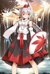 Rule 34 | 1girl, animal ears, black skirt, breasts, cloud, commentary request, commission, detached sleeves, fingernails, grey hair, hair between eyes, harusame (unmei no ikasumi), hat, highres, holding, holding shield, holding sword, holding weapon, inubashiri momiji, leaf print, legs apart, long fingernails, looking at viewer, maple leaf print, medium breasts, medium hair, outdoors, pom pom (clothes), red eyes, red hat, shield, shirt, skirt, solo, standing, sword, tassel, tokin hat, touhou, water, waterfall, weapon, white shirt, wide sleeves, wolf ears
