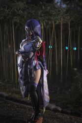 Rule 34 | 1girl, ayayachi, bamboo, bamboo forest, black shorts, black thighhighs, braid, bridal gauntlets, cosplay photo, expressionless, forest, from side, genshin impact, highres, japanese clothes, kimono, long hair, looking ahead, nature, night, photo (medium), purple hair, purple kimono, raiden shogun, shorts, solo, standing, thighhighs, very long hair