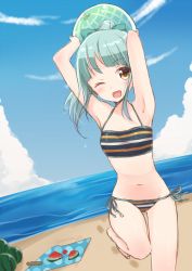 Rule 34 | 1girl, ;d, armpits, arms up, ball, bare arms, bare shoulders, beach, beachball, bikini, blue sky, blush, bow, breasts, brown eyes, cloud, day, food, fruit, green bow, green hair, groin, hair bow, halterneck, high ponytail, holding, holding ball, horizon, kantai collection, long hair, masuishi kinoto, name connection, navel, object namesake, ocean, one eye closed, open mouth, outdoors, ponytail, sand, side-tie bikini bottom, sky, small breasts, smile, solo, standing, standing on one leg, striped bikini, striped clothes, swimsuit, twitter username, water, watermelon, yuubari (kancolle)