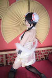 Rule 34 | 1girl, artist request, asian, bare shoulders, black hair, black thighhighs, blurry, bun cover, china dress, chinese clothes, color contacts, cosplay, date a live, depth of field, double bun, dress, feather boa, hair bun, hair over one eye, halter dress, halterneck, indoors, kneeling, lace, lace-trimmed legwear, lace trim, long hair, looking at viewer, looking back, makeup, mascara, no shoes, parted lips, photo (medium), red eyes, short china dress, sleeveless, sleeveless dress, solo, thighhighs, tokisaki kurumi, tokisaki kurumi (cosplay), twintails, zettai ryouiki