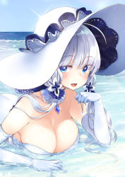 Rule 34 | 1girl, ahoge, azur lane, beach, blue eyes, blue sky, blush, breasts, cleavage, day, detached collar, dress, elbow gloves, glint, gloves, hat, highres, illustrious (azur lane), large breasts, long hair, looking at viewer, lying, mirei, mole, mole under eye, ocean, on stomach, open mouth, outdoors, silver hair, sky, smile, solo, sunlight, white dress, white gloves, white hat