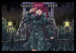 Rule 34 | 1girl, absurdres, animal ears, border, braid, cat ears, cat girl, dress, female focus, fence, grass, green dress, hair ribbon, highres, kaenbyou rin, lamp, night, open mouth, red eyes, red hair, ribbon, salute, short hair, smile, solo, touhou, twin braids, wooden fence, yinzhai