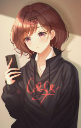 Rule 34 | 1girl, black sweater, blush, bosumonki, brown hair, cellphone, closed mouth, clothes writing, drawstring, hair ornament, hairclip, highres, higuchi madoka, holding, holding phone, idolmaster, idolmaster shiny colors, long sleeves, looking at phone, mole, mole under eye, phone, purple eyes, short hair, smartphone, solo, sweater, swept bangs, upper body