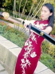 Rule 34 | 1girl, asian, china dress, chinese clothes, cosplay, cosplay photo, dress, katana, photo (medium), plant, solo, sword, weapon