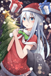 Rule 34 | 1girl, blue eyes, blush, bow, box, candy, candy cane, capelet, christmas, christmas tree, commentary request, dress, food, gift, gift box, green bow, hair between eyes, hands up, hibiki (kancolle), highres, holding, holding sack, kantai collection, long hair, parted lips, red capelet, red dress, sack, santa costume, silver hair, solo, standing, star (symbol), tateishi kureha, twitter username, very long hair