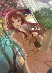 Rule 34 | 1girl, :d, bag, blush, brown coat, brown hair, brown hairband, building, bush, buttons, coat, cowboy shot, dashimeshi, day, double-breasted, dutch angle, floating hair, hair ornament, hairband, hand on own chin, hand up, handbag, idolmaster, idolmaster million live!, long bangs, long coat, long hair, long sleeves, looking at viewer, open mouth, outdoors, plant, pom pom (clothes), pom pom hair ornament, raised eyebrows, red eyes, road, sidelocks, smile, solo, street, tanaka kotoha, tree