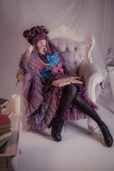 Rule 34 | 1girl, absurdres, ankle boots, armchair, black footwear, blue bow, blunt bangs, book, book stack, boots, bow, candle, chair, closed mouth, cosplay, cosplay photo, curtains, dress, frills, full body, hand on own head, hat, high heel boots, high heels, highres, holding, holding book, indoors, lantern, long hair, long sleeves, looking at viewer, mob cap, open book, patchouli knowledge, photo (medium), purple dress, purple eyes, purple hair, purple hat, ribbon, shoelaces, sitting, solo, striped clothes, table, tartetatin0516, thighhighs, touhou, wide sleeves