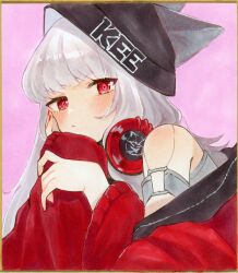 Rule 34 | 1girl, absurdres, animal ears, arknights, bare shoulders, beanie, black beanie, blush, chanoko (hytnmjtns), clothes writing, commentary request, diamond-shaped pupils, diamond (shape), ears through headwear, frostleaf (arknights), gold border, grey hair, grey shirt, hand on own cheek, hand on own face, hat, headphones, headphones around neck, highres, jacket, long hair, long sleeves, marker (medium), nail polish, off shoulder, pink background, red eyes, red jacket, red nails, shikishi, shirt, solo, symbol-shaped pupils, traditional media, upper body