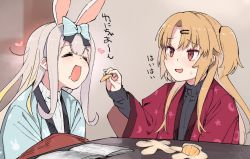 Rule 34 | 2girls, akatsuki uni, animal ears, blush, book, bow, closed eyes, crescent, dated, feeding, food, fruit, hair bow, hair ornament, hairclip, heart, holding, holding food, holding fruit, kotatsu, light brown hair, long hair, mochizuki himari, multiple girls, one side up, open mouth, orange peel, rabbit ears, red eyes, ribbed sweater, rkrk, saliva, signature, silver hair, sitting, star (symbol), sweat, sweater, table, turtleneck, turtleneck sweater, uni create, virtual youtuber