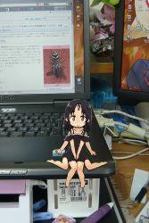 Rule 34 | 1girl, black hair, computer, croixsan, extra arms, female focus, laptop, mini person, minigirl, monster girl, multiple legs, original, pen, photo background, pointy ears, red eyes, sitting, smile, solo, third eye, v arms