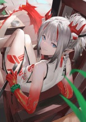 Rule 34 | 1girl, arknights, arm support, bangle, bare arms, bare legs, blazpu, blue eyes, bracelet, braid, china dress, chinese clothes, dress, grey hair, grin, highres, holding, indoors, jewelry, leaning back, looking at viewer, looking back, multicolored hair, nian (arknights), nian (unfettered freedom) (arknights), on chair, pointy ears, ponytail, red hair, sitting, sleeveless, smile, solo, streaked hair, teeth, thighs