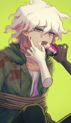 Rule 34 | 1boy, 1girl, absurdres, aji kosugi, brown pants, coat, collarbone, commentary request, cupcake, danganronpa (series), danganronpa 2: goodbye despair, disembodied hand, enoshima junko, feeding, food, food on face, green background, green coat, grey hair, hair between eyes, highres, holding, holding food, komaeda nagito, male focus, messy hair, nail polish, open clothes, open coat, open mouth, pants, red nails, restrained, rope, shirt, solo focus, white shirt