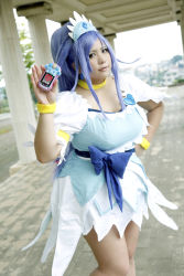 Rule 34 | 1girl, ankle boots, asian, blue eyes, blue hair, boots, bow, bracelet, breasts, cellphone, choker, chouzuki maryou, cleavage, cosplay, cure diamond, cure diamond (cosplay), dokidoki! precure, dress, hand on own hip, headpiece, highres, jewelry, large breasts, long hair, magical girl, matching hair/eyes, phone, photo (medium), plump, ponytail, precure, puffy short sleeves, puffy sleeves, ribbon, short sleeves, solo, tiara