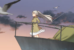 Rule 34 | 1girl, annin musou, bird, brown coat, brown eyes, cannon, cloud, coat, conte di cavour (kancolle), dawn, dress, feet out of frame, gradient sky, grey hair, hands in pockets, kantai collection, long hair, long sleeves, railing, seagull, sky, two side up, white dress