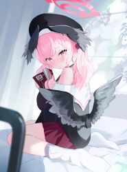 Rule 34 | 1girl, beret, black footwear, black shirt, black wings, blue archive, blush, book, bra strap, commentary request, feathered wings, from side, full body, furrowed brow, halo, hat, head wings, highres, holding, holding book, koharu (blue archive), long hair, looking at viewer, low wings, manga (object), off shoulder, on bed, pink eyes, pink hair, red skirt, sankichi (croquette crab), shirt, single bare shoulder, sitting, skirt, socks, solo, sweatdrop, twintails, wariza, white socks, wings