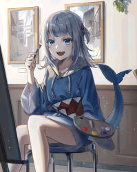 Rule 34 | 1girl, blue eyes, blue hair, blue hoodie, blush, canvas (object), collarbone, cropped, fingerless gloves, fins, fish tail, gawr gura, gloves, grey hair, holding, holding brush, holding paintbrush, holding palette, hololive, hololive english, hood, hood down, hoodie, indoors, light particles, long hair, multicolored hair, nekoreito, open mouth, paint, paintbrush, painting (object), palette (object), plant, shark girl, shark tail, sharp teeth, sitting, smile, solo, stitches, stool, streaked hair, tail, teeth, thighs, upper teeth only, virtual youtuber, wide sleeves, zipper pull tab