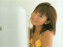 Rule 34 | 1girl, asian, brown hair, halterneck, ichikawa yui, indoors, looking at viewer, mole, photo (medium), refrigerator, smile, solo, tagme