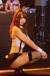 Rule 34 | 1girl, asian, ass, bare shoulders, brown hair, enako rin, fishnet thighhighs, fishnets, high heels, highres, japanese (nationality), lips, long hair, looking at viewer, photo (medium), rabbit ears, rabbit tail, shorts, sitting, smile, solo, suspenders, tank top, thighhighs, thighs