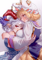 Rule 34 | 2girls, absurdres, blonde hair, blush, bow, breasts, curly hair, dress, earrings, fox tail, hat, highres, horn ornament, horn ribbon, horns, hug, jewelry, large breasts, long sleeves, masanaga (tsukasa), mob cap, multiple girls, multiple tails, open mouth, pointy ears, red eyes, red horns, ribbon, sheep horns, short hair, short sleeves, simple background, tail, touhou, toutetsu yuuma, white hair, yakumo ran, yuri